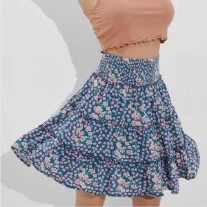 navy blue american eagle skirt with pink floral design